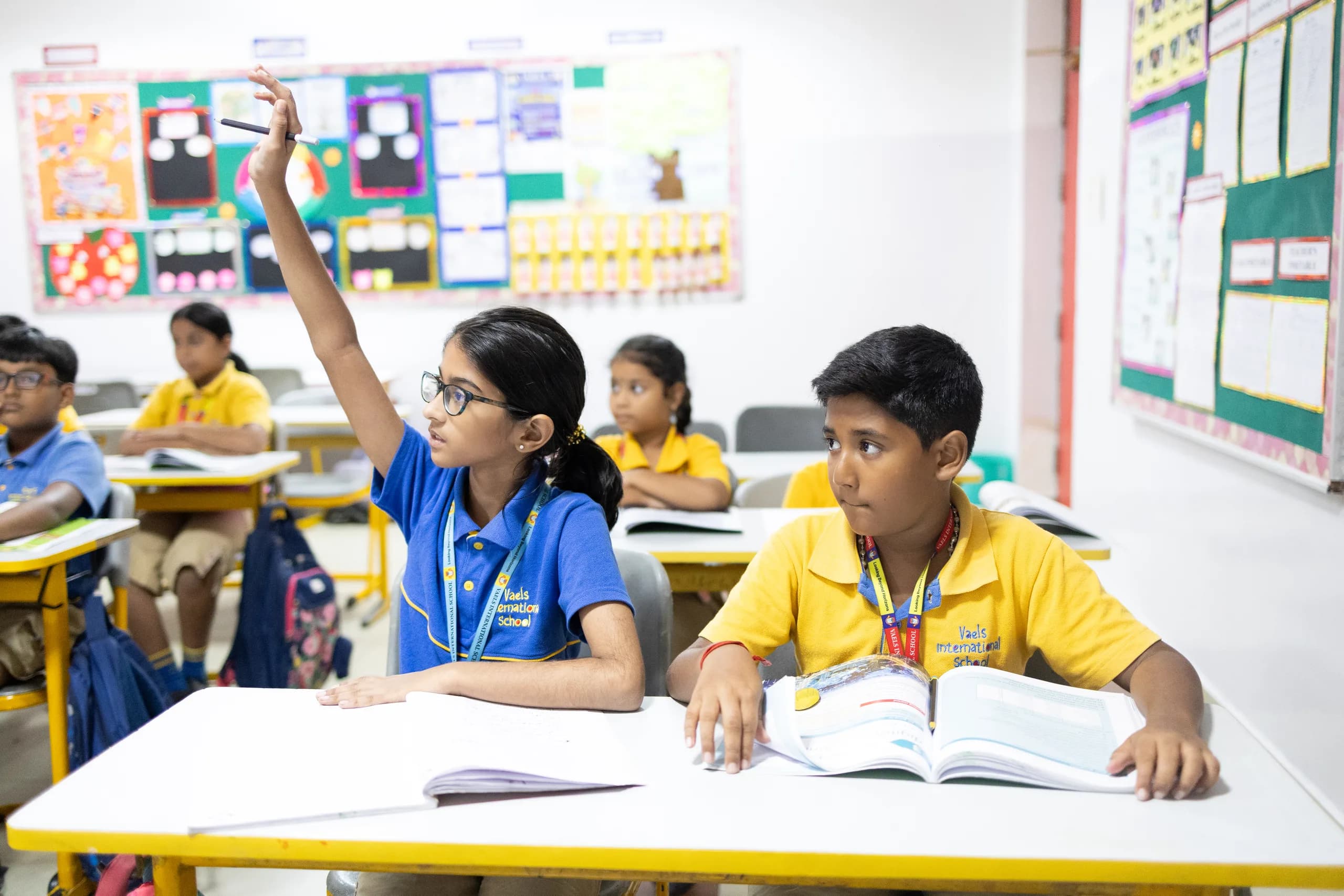 Grade 4 children in an active hands-on lesson at Vaels