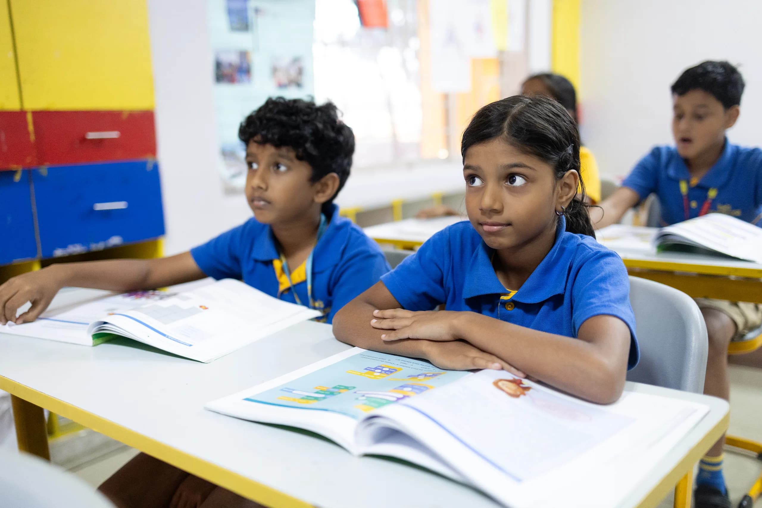 A Grade 4 student displaying curiosity during a classroom session