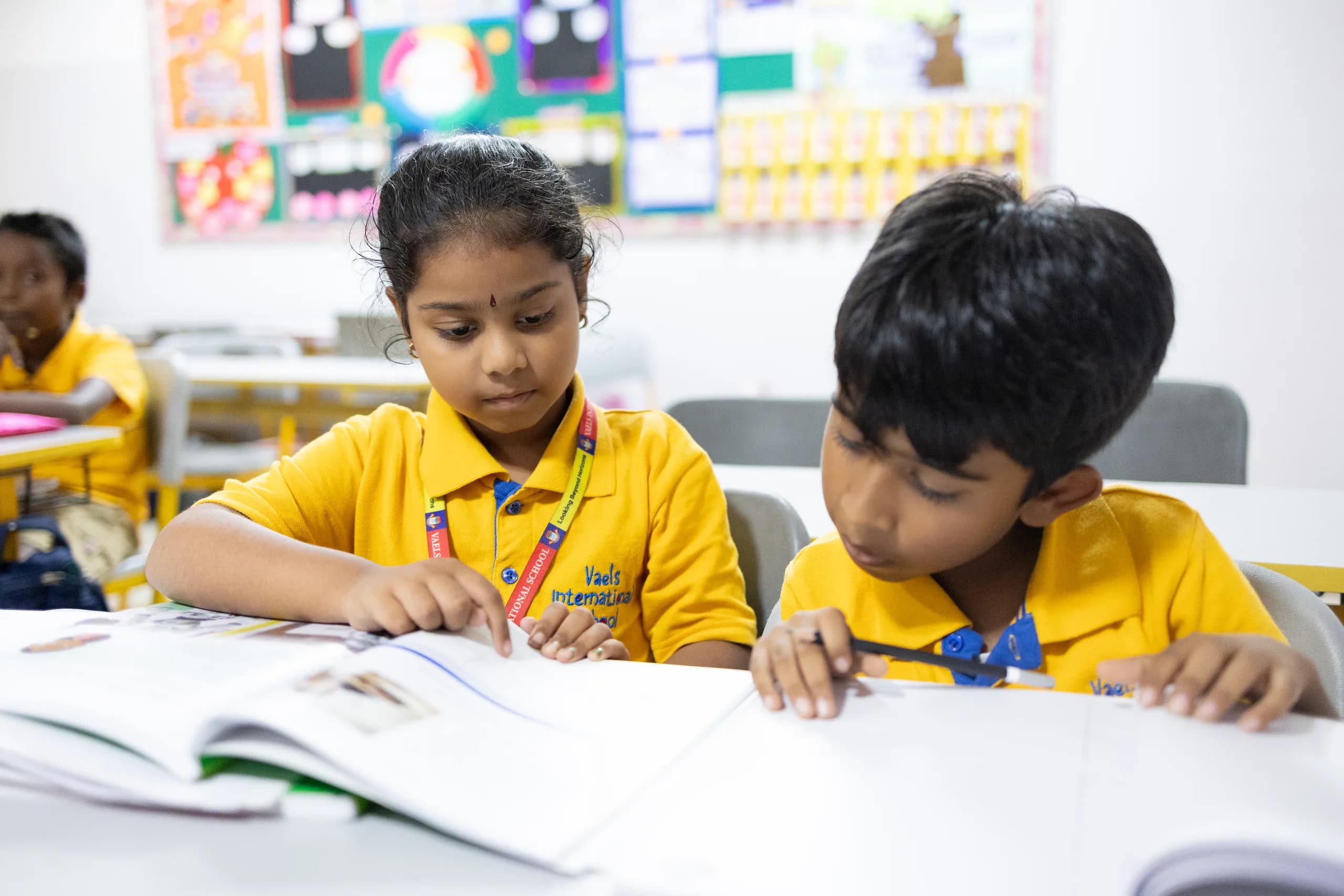 Attentive Grade 4 students listening in class