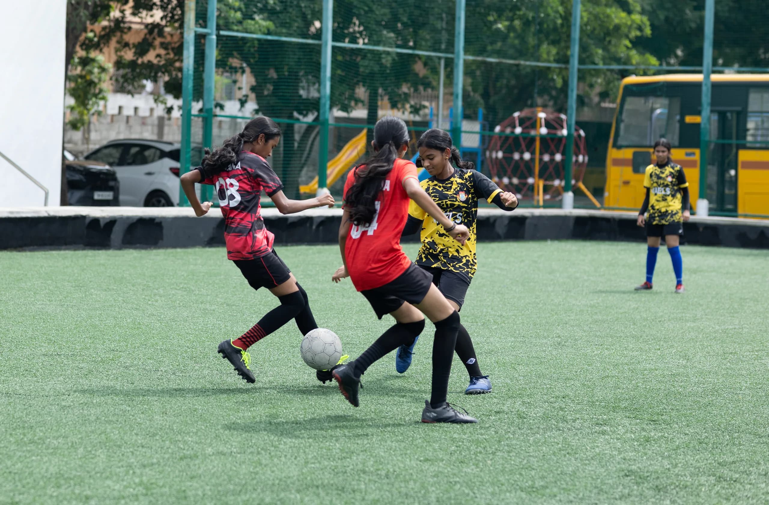 Intense moment during a girls football match at Vaels International School
