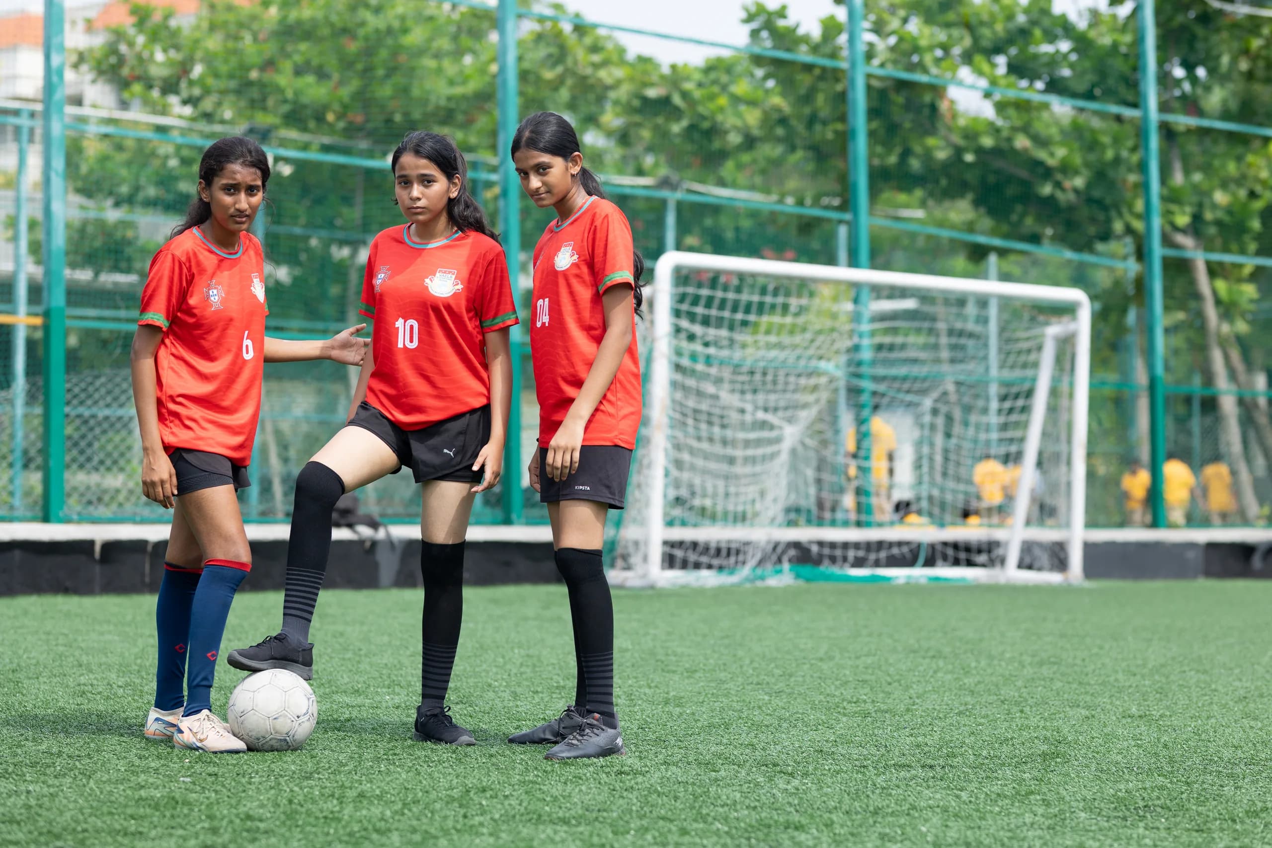 Girls football team on the attack during a competitive match